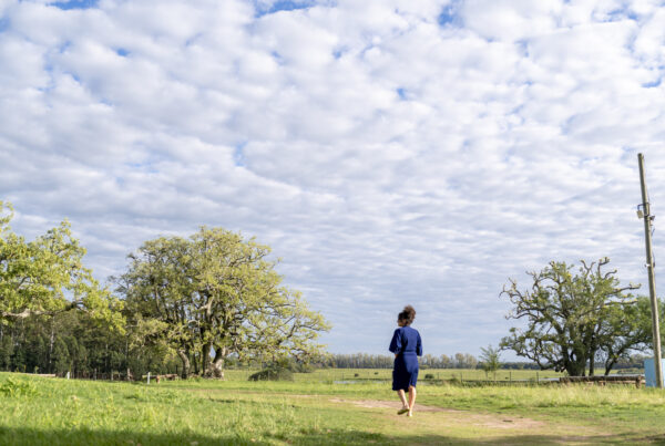 Houses for Sale in North Laredo, TX: What Buyers Should Know 1 Woman walking outdoors in the field.